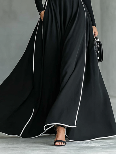 Maxi Kleid Schwarz mit Weißen Nähten, Hohem Kragen, Langen Ärmeln und Tailliertem Schnitt